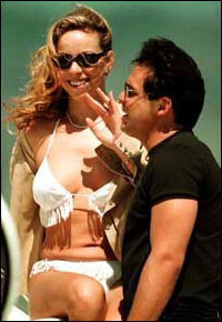 Mariah Too Much For Luis Miguel