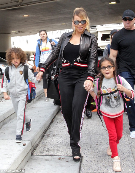 Mariah Carey jets out of LAX with her twins | mcarchives.com