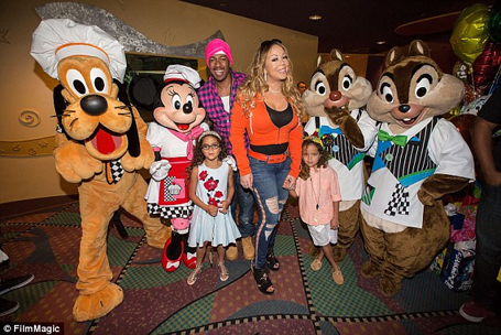 Mariah and Nick take their twins to Disneyland | mcarchives.com