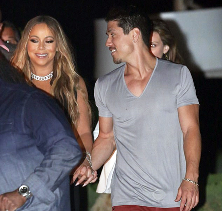 Mariah holds hands with on/off flame Bryan Tanaka | mcarchives.com