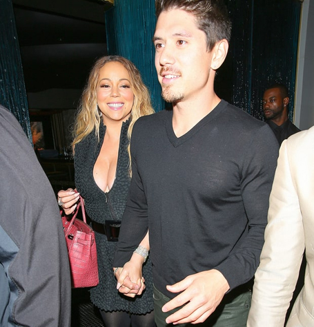 Mariah and Bryan have affectionate date night | mcarchives.com