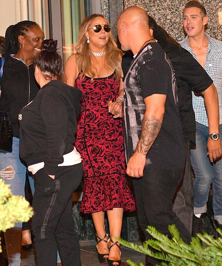 Mariah Carey squeezes into a tight floral dress | mcarchives.com