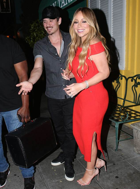 Mariah in sizzling red gown for dinner date with Bryan | mcarchives.com
