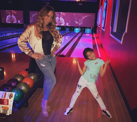 Mariah Carey goes bowling in super-high platform heels | mcarchives.com