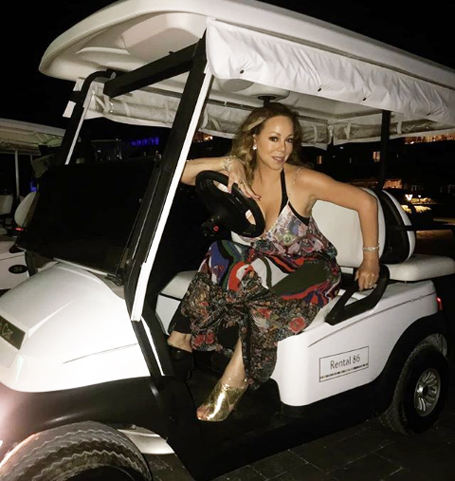 Mariah Carey is off to the studio in a golf cart | mcarchives.com