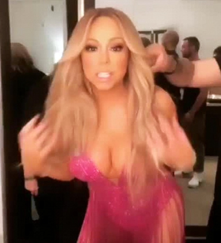 Mariah Carey dazzles in sexy pink dress | mcarchives.com