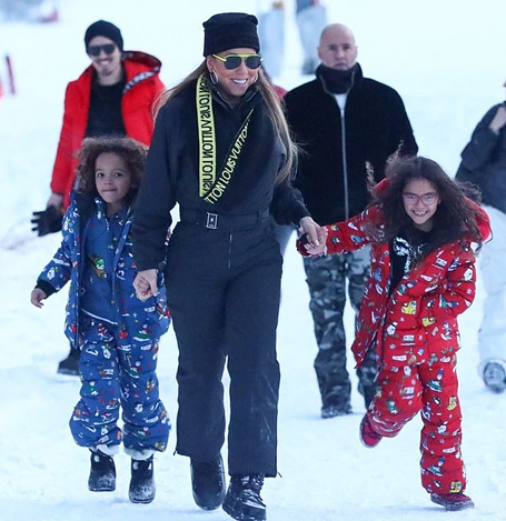 Mariah Carey plays in the Aspen snow with her twins | mcarchives.com
