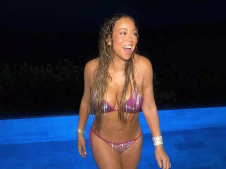 Mariah Carey shows off a toned figure | mcarchives.com