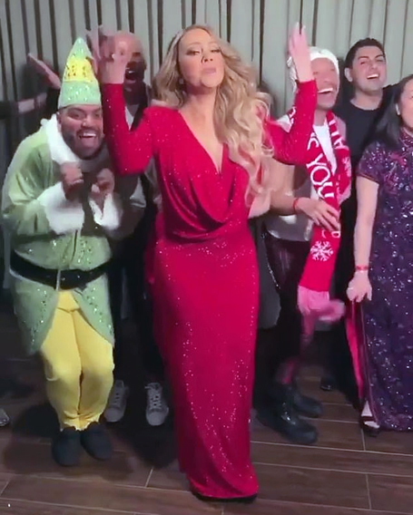 Mariah lip-syncs her seasonal hit with festive friends | mcarchives.com