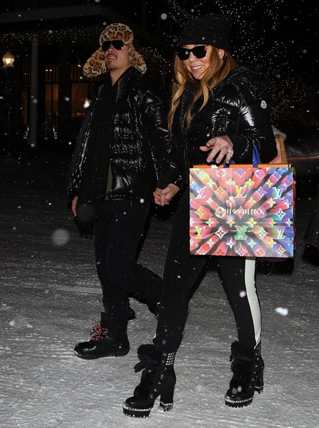 Mariah Carey shops at Louis Vuitton in Aspen | mcarchives.com