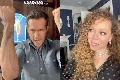 Mariah side-eyes Ryan Reynolds when their duet goes bad | mcarchives.com