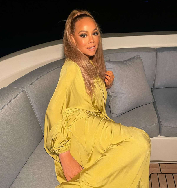 Mariah Carey is a springtime vision in a silky yellow gown | mcarchives.com