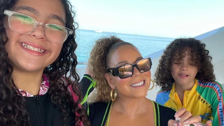 Mariah Carey beams on vacation with twins | mcarchives.com