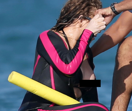 Mariah Carey's nipple slips out of wetsuit