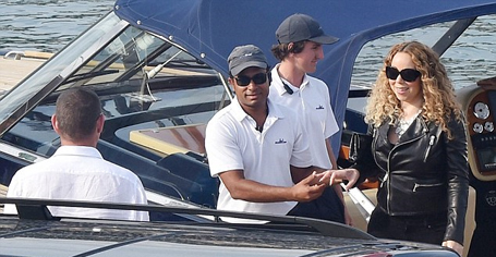 Mariah Carey and James Packer board helicopter | mcarchives.com