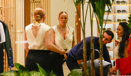 Mariah Carey wears plunging white dress to try on rings | mcarchives.com
