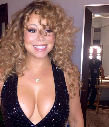 Mariah Carey flashes new bling from beau James Packer | mcarchives.com