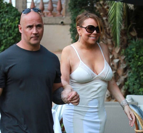 Mariah Carey looks glamorous in plunging white dress  | mcarchives.com